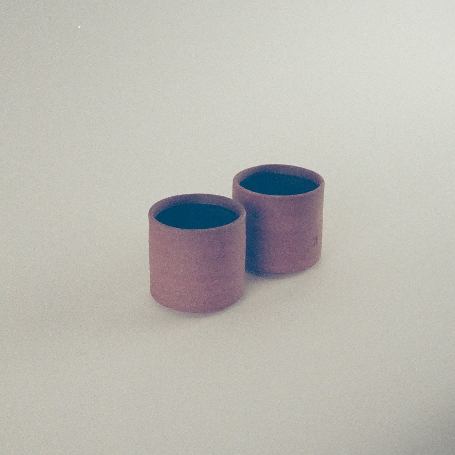 Red Cups with Black Glaze Interior